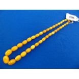 A butterscotch Amber beaded necklace, 26 grams, a.