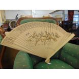 A Chinese wooden fan