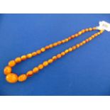 A butterscotch Amber beaded necklace,