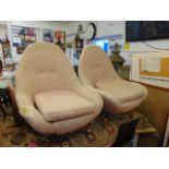 A pair of Greaves and Thomas Egg chairs, one a.