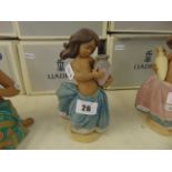 A boxed Lladro figure of a girl,