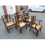 A set 10 Chippendale style elbow chairs.