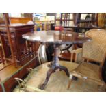 A Victorian tripod table