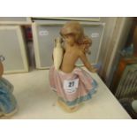 A boxed Lladro figure of a girl