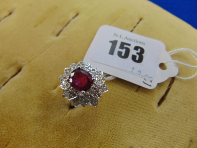 An 18ct White Gold Diamond and Ruby cocktail ring,