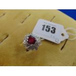 An 18ct White Gold Diamond and Ruby cocktail ring,