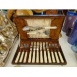 A cased set of fish cutlery