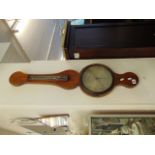 A barometer/ thermometer