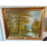 A gilt framed woodland scene