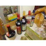 Five bottles of alcohol, Cinzano, Campari,