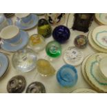 A qty of glass paperweights