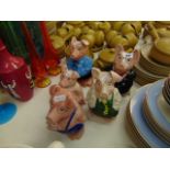 A family of Wade Natwest piggy banks,