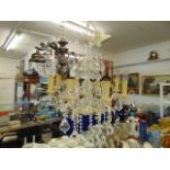 A large crystal eight branch chandelier