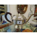 A hallmarked Silver teapot,