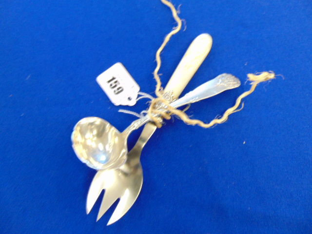 A Danish hallmarked Silver sauce ladle and a mother of pearl handled and HM silver spoon