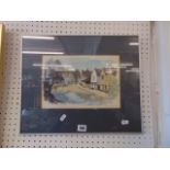 A framed village scene, limited edition print,