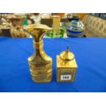 Two gilt hallmarked silver designer perfume bottles