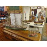 Four model boats,