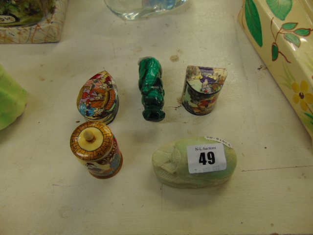 Three hand painted lidded boxes,