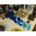 A collection of blue and green glass