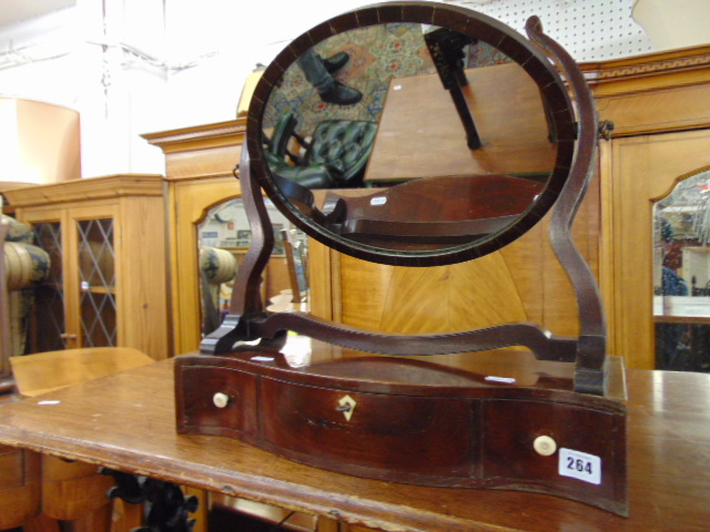 A Regency toilet swing mirror