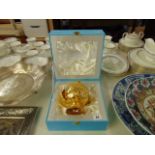 A gilt and porcelain, novelty piece, boxed,