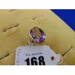 An 18ct White Gold Diamond and Amethyst ring,