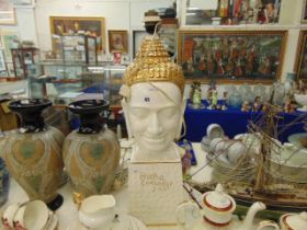 A porcelain Buddha lamp