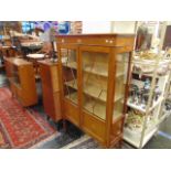 An Edwardian inlaid two door display cabinet