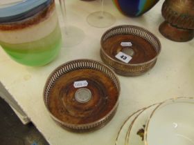 Two Silver coasters