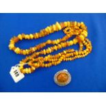 Two Vintage Baltic Amber necklaces plus a brooch