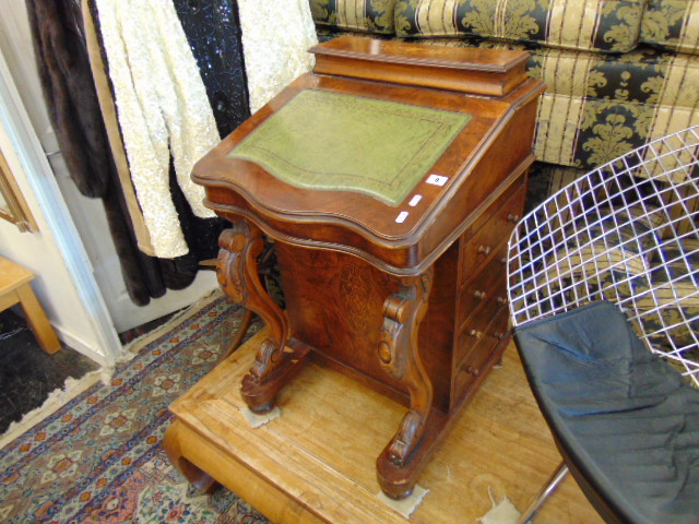 A Walnut inlaid Davenport