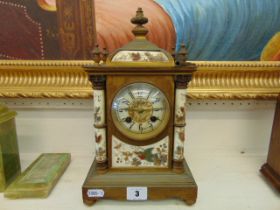 A ceramic and brass French mantle clock, a.