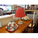 Three Tiffany style shades and a table lamp