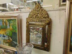 A gilt hall mirror,