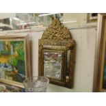 A gilt hall mirror,