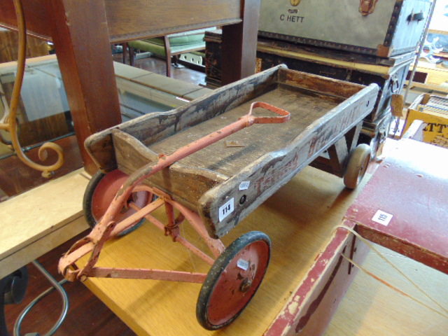 A vintage Children's pull-along cart