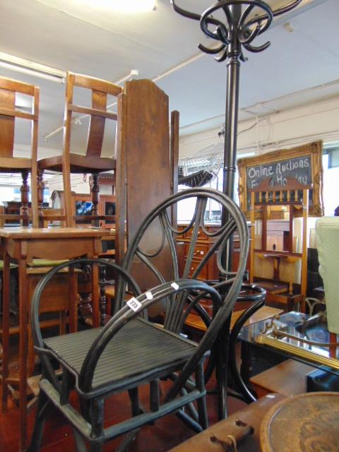 A Bentwood hatstand and a rattan chair