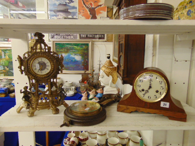 A brass decorative clock,