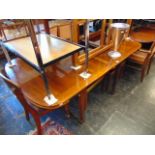 A Mahogany extending table