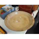 An antique wooden bowl