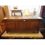 An Oak linen fold blanket box