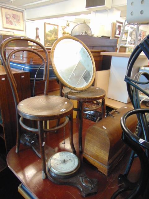 A Singer sewing machine with priginal receipt, 1947, two early Bentwood chairs,