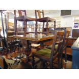 An Oak drawleaf table and four chairs