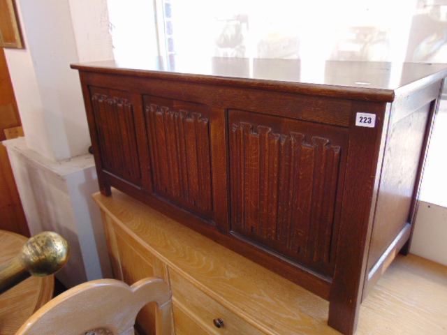 An Oak linen fold blanket box