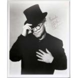 ELTON JOHN - A SIGNED PHOTOGRAPH.