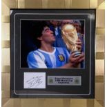 DIEGO MARADONA - A SIGNED PHOTOGRAPH.