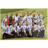 GOLF MEMORABILIA - A FULLY SIGNED 2004 RYDER CUP TEAM PHOTO.