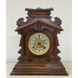 OAK-CASED ANSONIA MANTEL CLOCK.