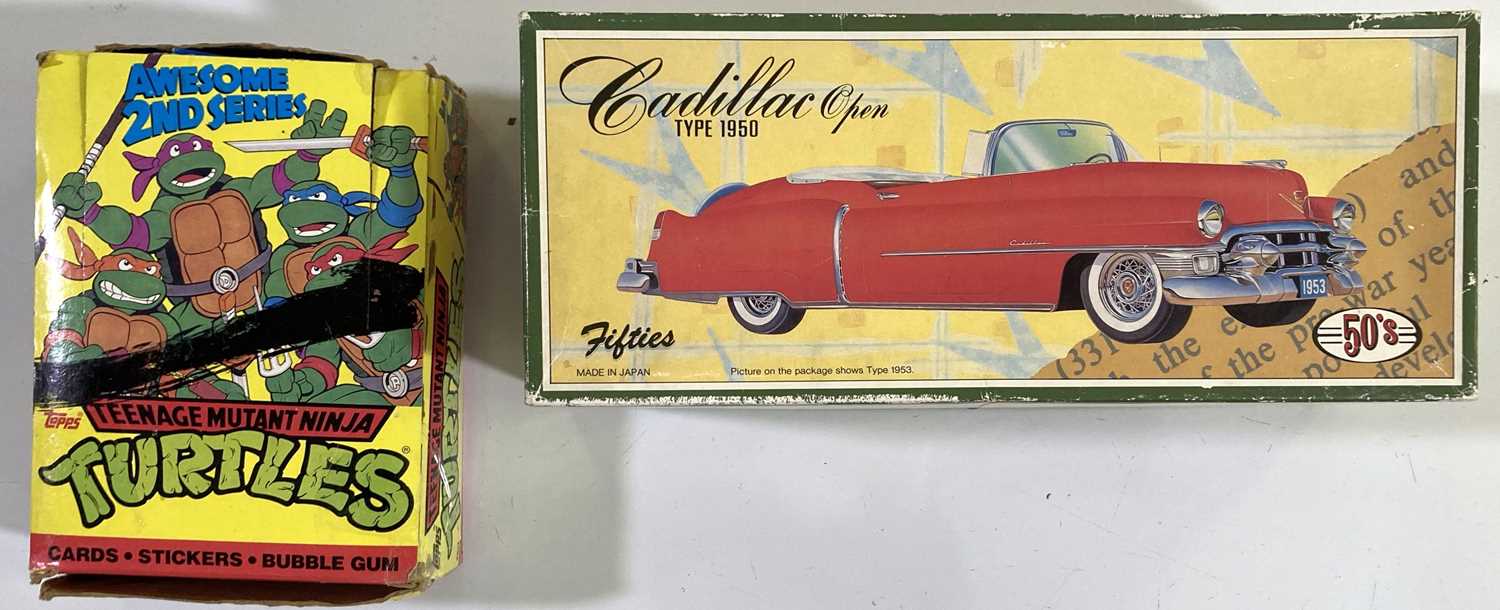 TEENAGE MUTANT NINJA TURTLES COMPLETE BOX OF UNOPENED TOPPS CARDS / A CADILLAC 'FIFTIES' CAR.